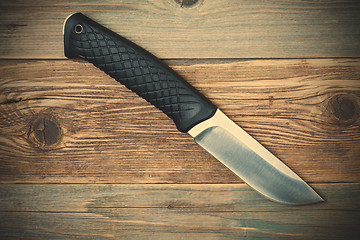 Image showing hunting knife with a black handle