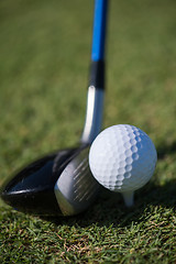 Image showing golf club and ball in grass