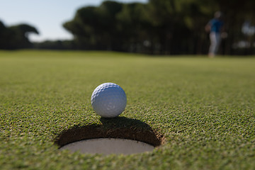 Image showing golf ball in the hole