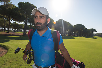 Image showing golf player walking