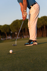 Image showing golfer  hitting shot at golf course