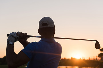 Image showing golfer hitting long shot