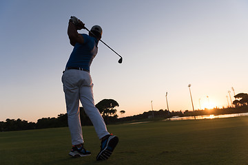 Image showing golfer hitting long shot