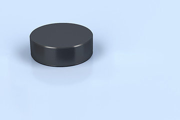 Image showing Hockey puck on ice 
