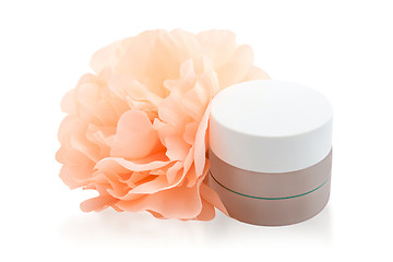 Image showing Spa cosmetic cream and flower isolated on white