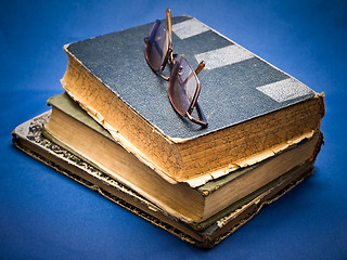 Image showing Glasses on the Old Book