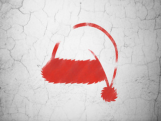 Image showing Holiday concept: Christmas Hat on wall background