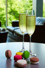 Image showing Two glasses of sparkling wine or champagne on a table