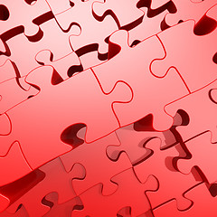 Image showing Red jigsaw puzzle with 3D effect  