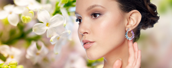 Image showing close up of beautiful woman face with earring