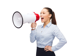Image showing screaming businesswoman with megaphone