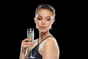 Image showing young asian woman drinking champagne at party