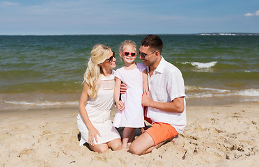 Image showing happy family in sunglasses on summer beach