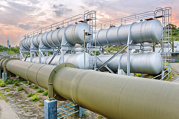 Image showing Oil and gas industry refinery factory at sunset