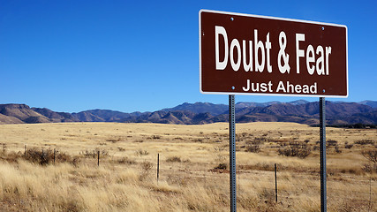 Image showing Doubt and Fear brown road sign brown road sign