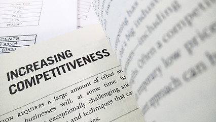 Image showing Increasing competitiveness word on the book 