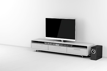 Image showing Tv and soundbar with subwoofer