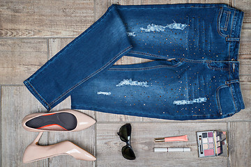 Image showing Aerial  view of woman\'s jeans and accessories