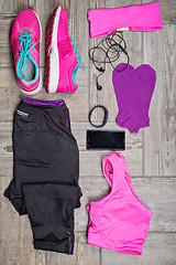 Image showing Flat lay shot of woman\'s sport accessories