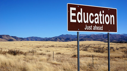 Image showing Education brown road sign