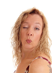 Image showing Woman blowing a kiss.
