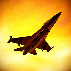 Image showing Fighter jet flying against a blue sky, 3d illustration