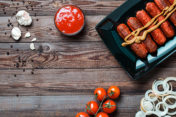 Image showing Sausage roasted on the grill.