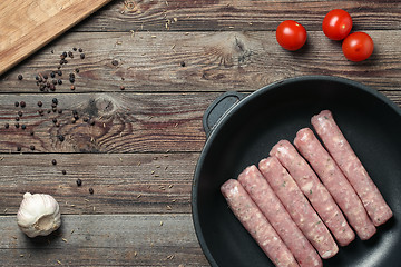 Image showing Raw Sausages in a Pan