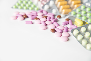 Image showing Colorful tablets on white background