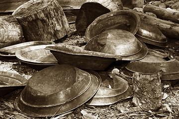 Image showing gold pans in sepia