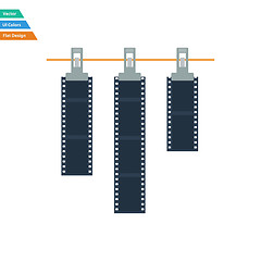 Image showing Flat design icon of photo film drying on rope with clothespin