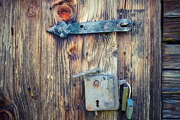 Image showing ancient locks on wooden door