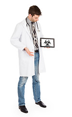 Image showing Doctor holding tablet - Warning! Biohazard!