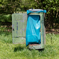 Image showing Broken litter bin in the park