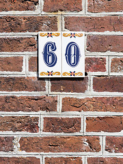 Image showing House number on a red brick wall in the Netherlands