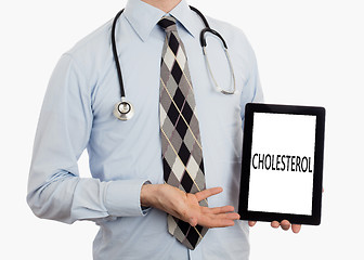 Image showing Doctor holding tablet - Cholesterol