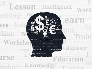 Image showing Learning concept: Head With Finance Symbol on wall background