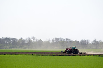 Image showing Tractor in a dry landscape