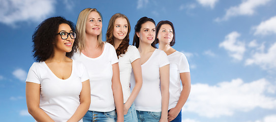 Image showing group of happy different women in white t-shirts