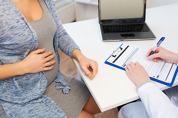 Image showing close up of doctor and pregnant woman at hospital