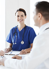 Image showing group of happy doctors meeting at hospital office