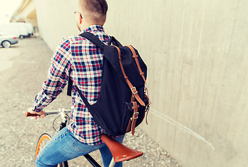 Image showing hipster man with fixed gear bike and backpack