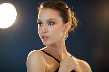 Image showing beautiful young asian woman with earring