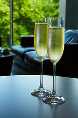 Image showing two glasses of champagne with a tray cheese