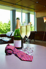 Image showing bottle of champagne and two glasses on the table