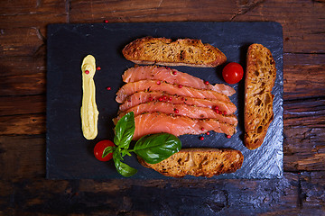 Image showing salmon slices and tomatoes