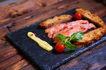 Image showing salmon slices and tomatoes