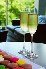 Image showing Two glasses of sparkling wine or champagne on a table