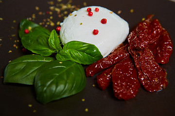 Image showing Buffalo mozzarella Burrata, basil and tomatoes