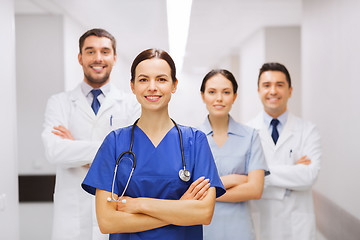 Image showing happy group of medics or doctors at hospital